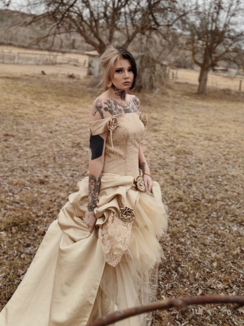 Vintage-Inspired Champagne Ball Gown with Floral Details